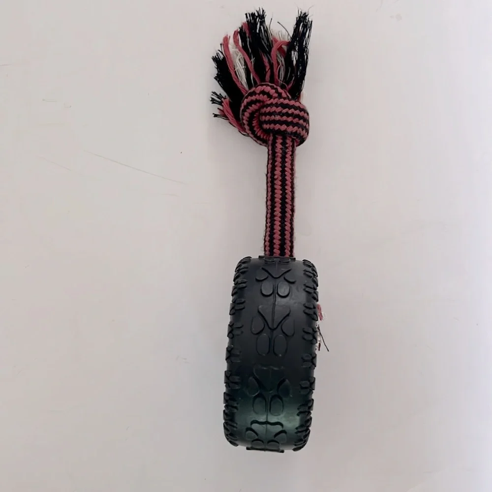 Mammoth Tire Biter Black Tire w/attached Red & Black Knotted Rope For Tugging.